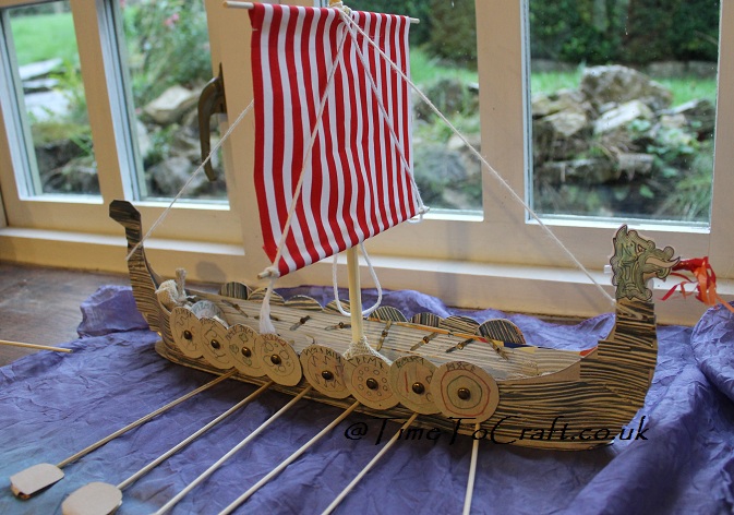 model long boat and oars