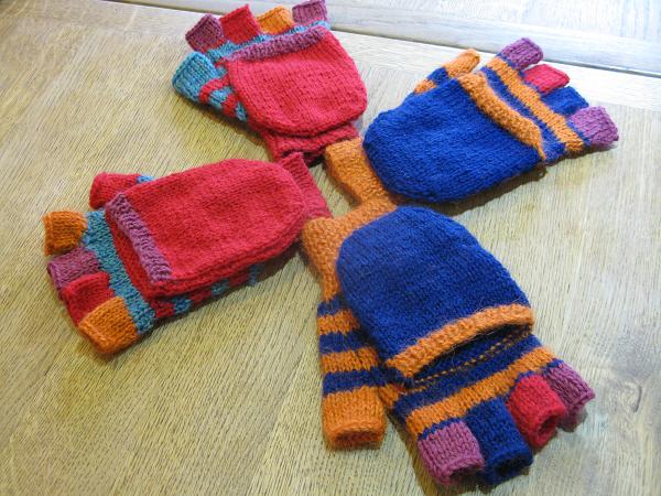 two sets of fliptop mittens