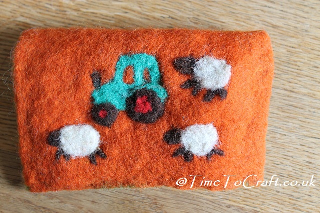 tractor and sheep needlefelted wallet front