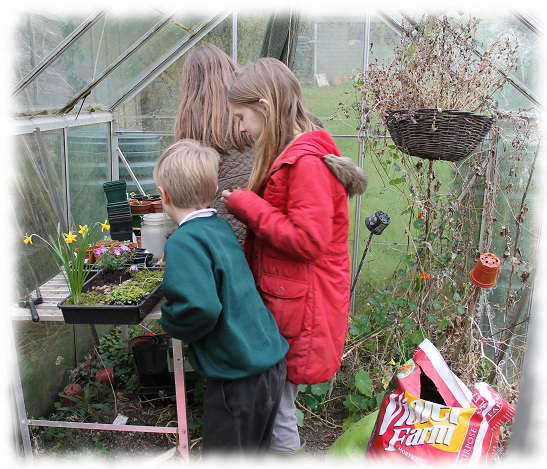 children in greenhouse