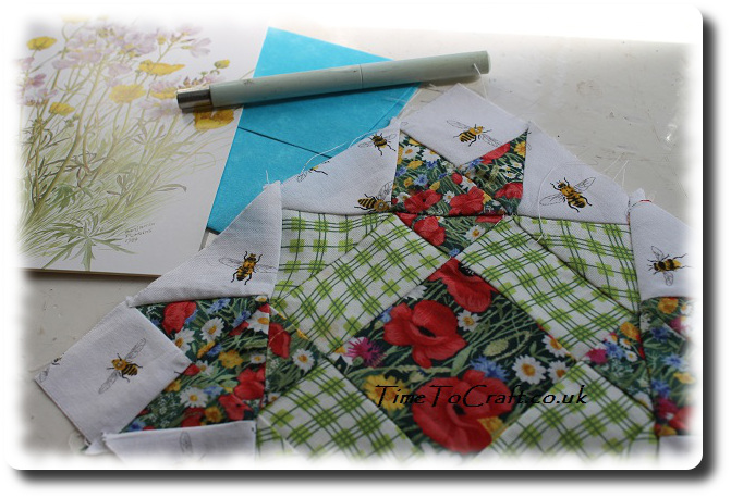 letter and quilt square