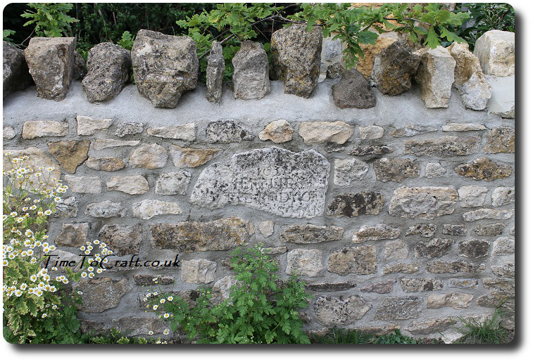 gravestone in wall
