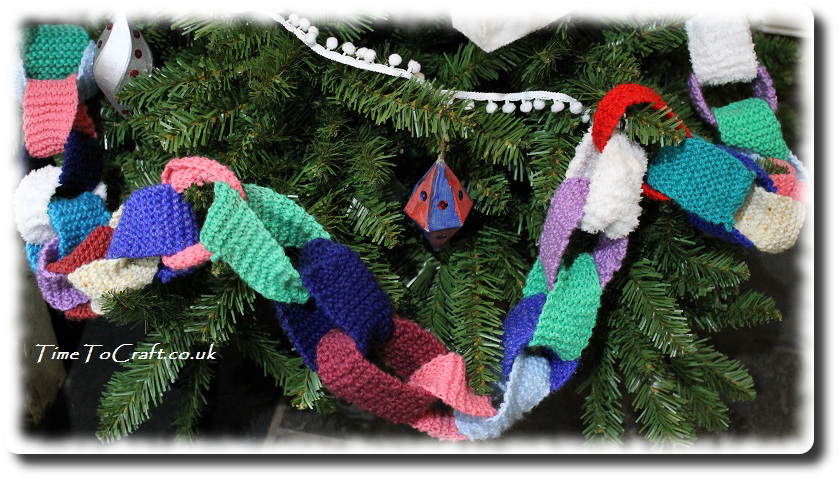 knitted paper chain on tree
