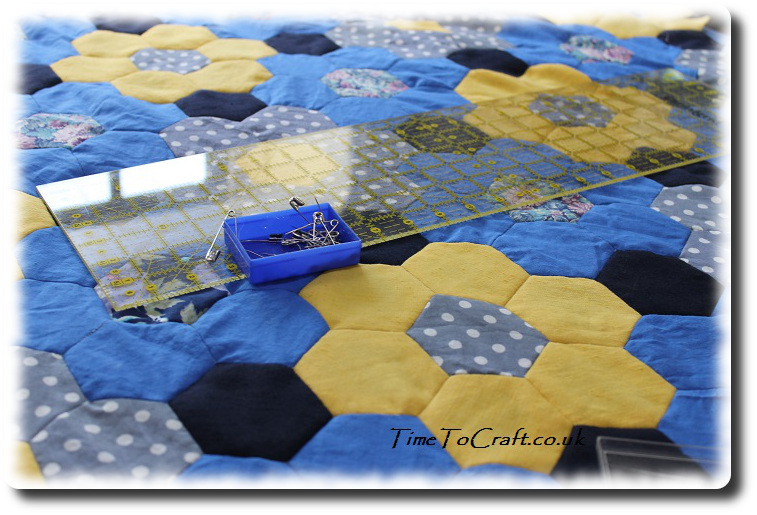 blue and yellow hexagon quilt top