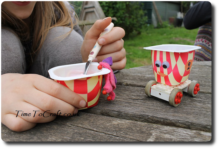 doll eating petits filous squares yogurt