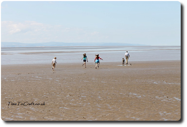 family on beach at Burnham