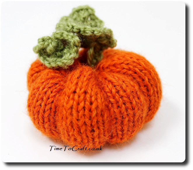 knitted pumpkin with tendrils