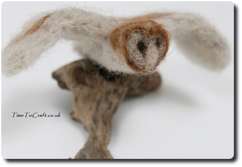 needlefelted barn owl flying on branch 2
