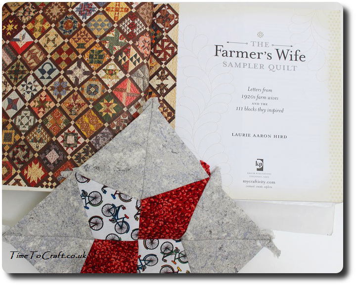 Periwinkle withThe Farmers wife letters book open