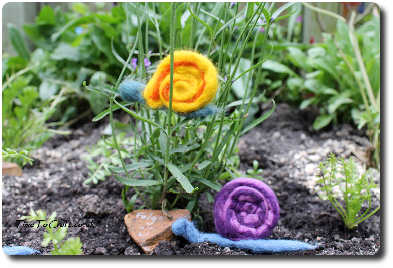felted snails on plants kids craft activity