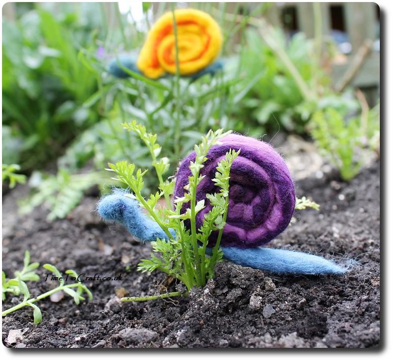 kids craft felted snail on poached egg plant