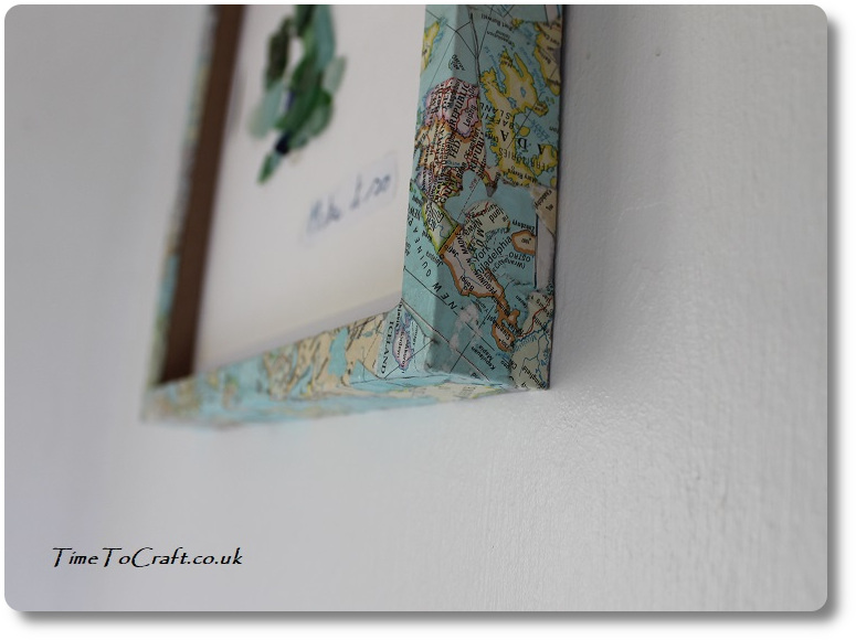 corner of frame from maps and sea glass project