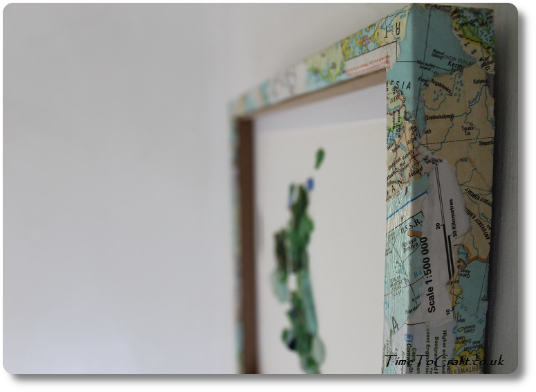 side of frame covered in maps