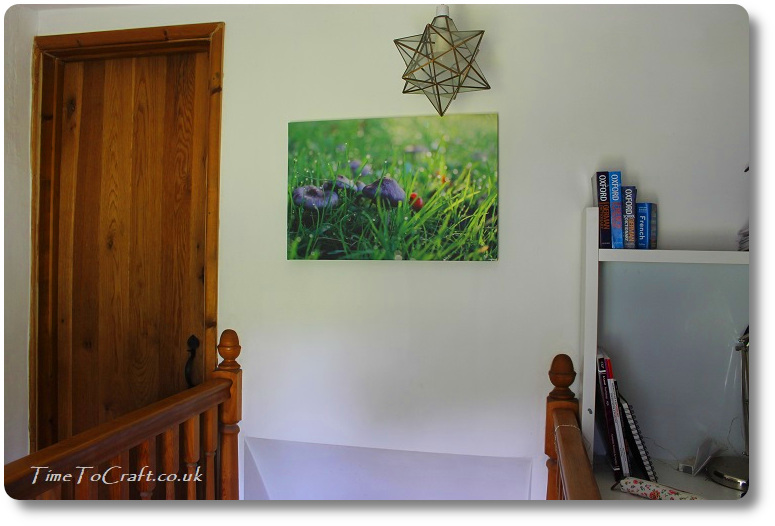 photo canvas at top of stairs