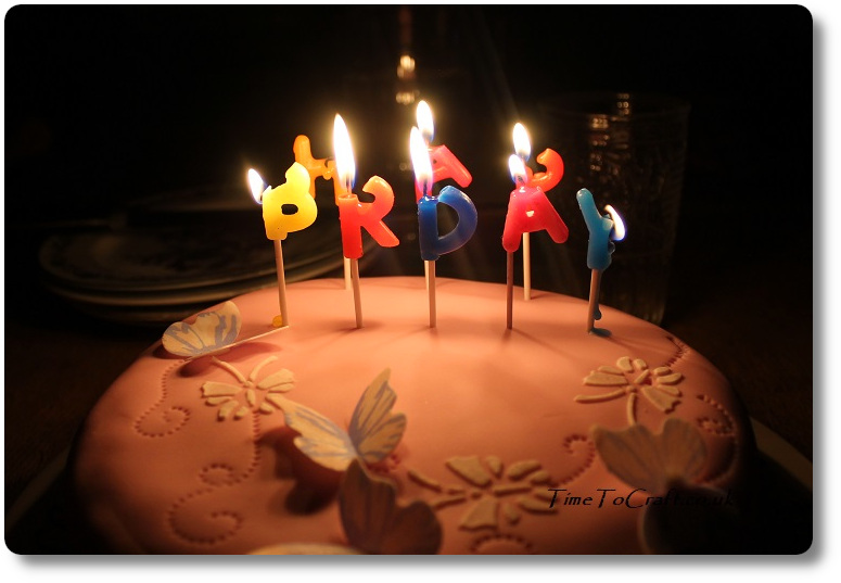 Birthday cake with candles lit
